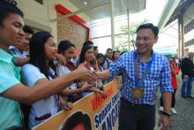 File photo: Senator Sonny Angara with students in Zamboanga